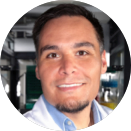 Dr. Anthony Zamora A headshot of a smiling man in a lab coat